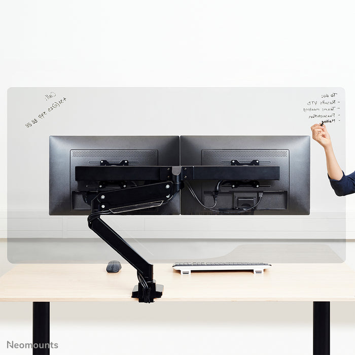 Neomounts NS-PLXPROTECT2 is een transparant scherm t.b.v. 2 flat screens en biedt afstandsbescherming op de werkvloer - Transparant acrylaat, 100% recyclebaar | PLXPROTECT van is geregistreerd als EU-Design patent |