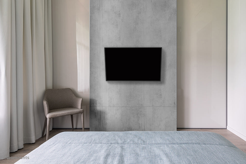 Neomounts WL40-550BL12 full motion wandsteun voor 32-55 inch schermen - Zwart