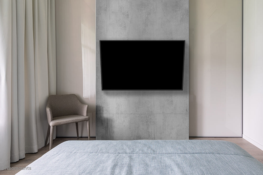 Neomounts WL40-550BL18 full motion wandsteun voor 43-75 inch schermen - Zwart